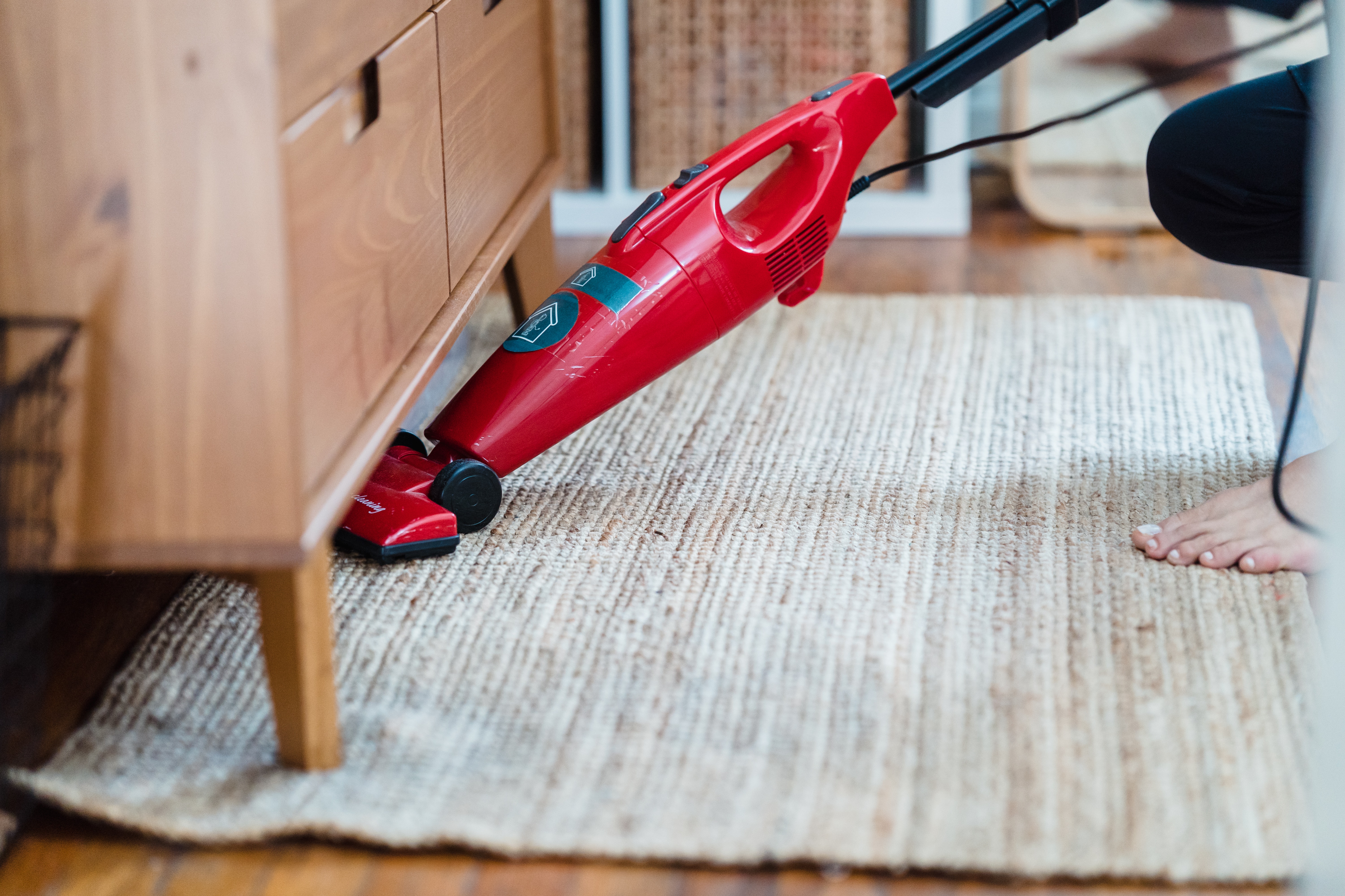 Red Vacuum on Rug