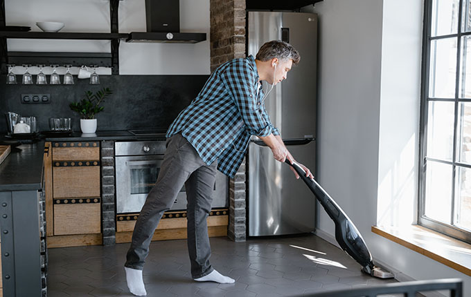 Man Vacuuming