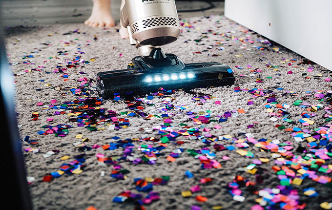 Vacuuming Glitter on Floor