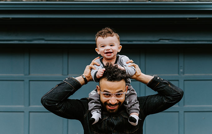 Kid on Dads Shoulders