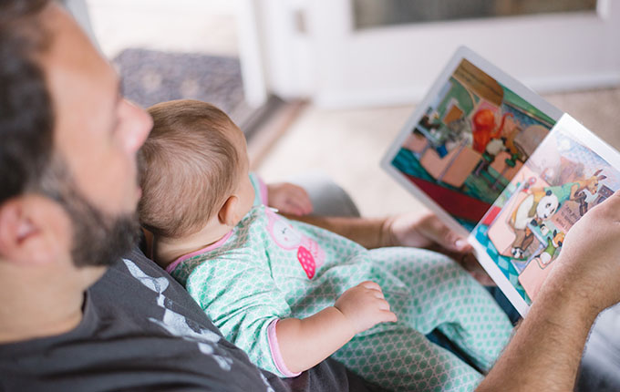 Father reading to child