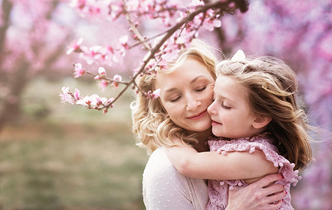 Mother hugging child