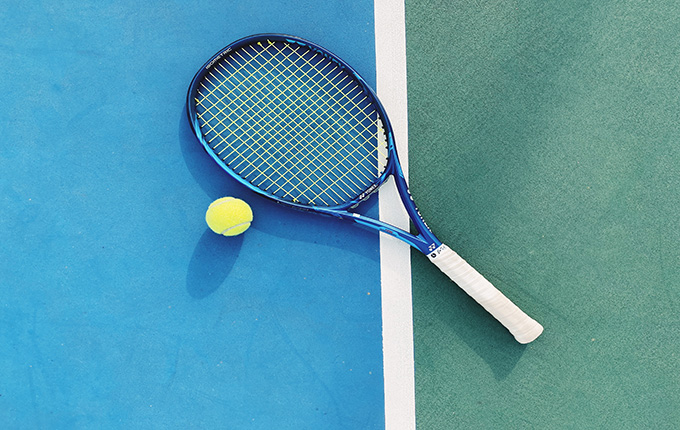Tennis Racket on the Court