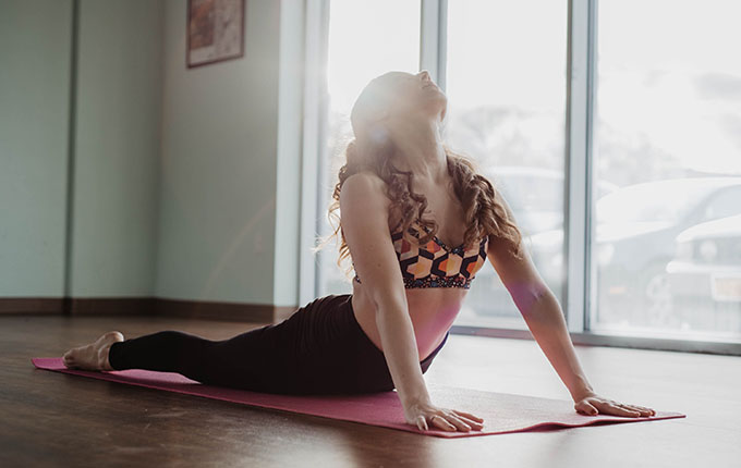 Woman stretching out her back