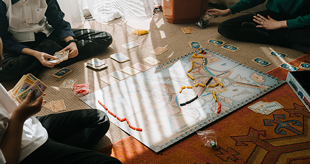 Friends Playing Ticket to Ride